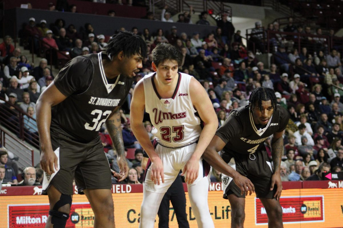 Photo: siena saints vs umass minutemen basketball match player stats