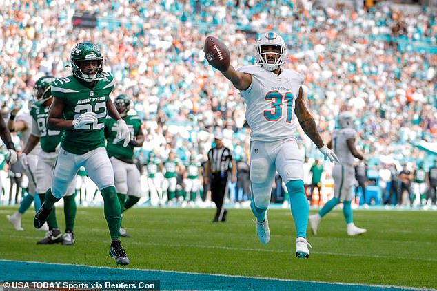 Photo: dolphins rushing td record