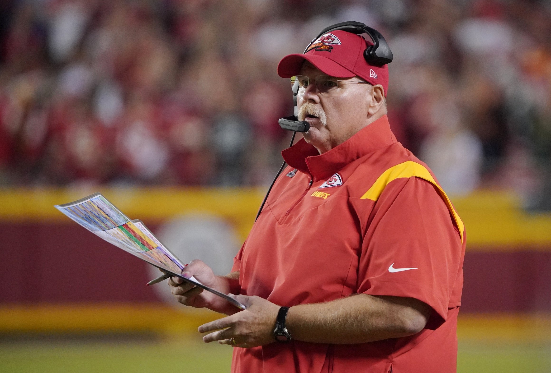 Photo: andy reid salary