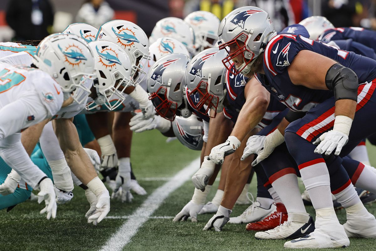 Photo: dolphins vs patriots betting