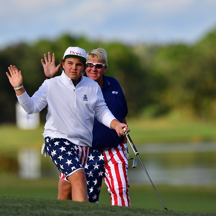 Photo: father and son golfers